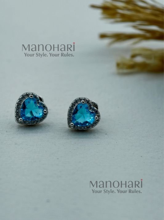 MN-ER-ABHS-AUR-01_2 Aurelia blue heart spark earrings with elegant crystal heart detailing