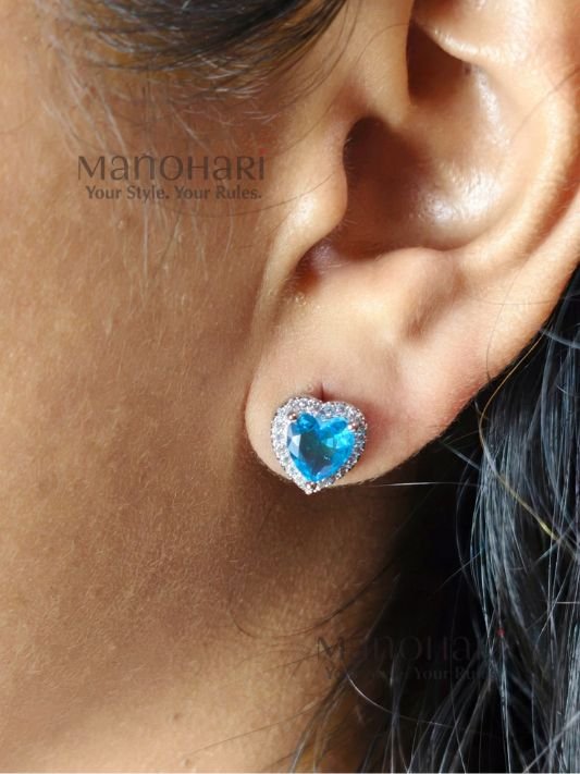 MN-ER-ABHS-AUR-01_3 Aurelia blue heart spark earrings with elegant crystal heart detailing