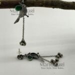 Aarini silver bird heritage earrings with oxidized gemstone detailing