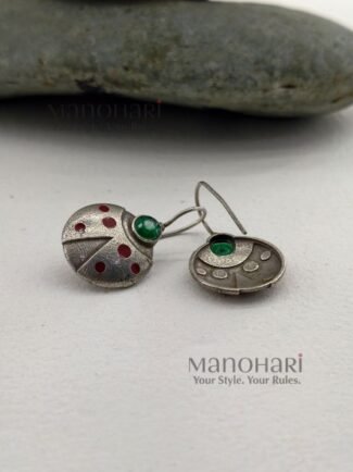 Aarini scarlet sparkle earrings with red crystal ladybug charm detailing