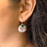 Aarini scarlet sparkle earrings with red crystal ladybug charm detailing