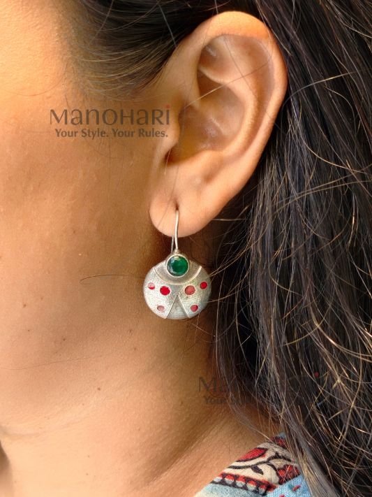 Aarini scarlet sparkle earrings with red crystal ladybug charm detailing