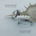 Meher crystal silver earrings with sparkling cubic zirconia detailing