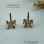 Meher rose crystal butterfly earrings with elegant rose gold sparkle detailing
