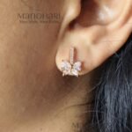 Meher rose crystal butterfly earrings with elegant rose gold sparkle detailing