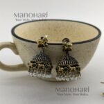 Ishani Pichwai dual tone jhumkas handcrafted oxidized earrings
