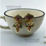 Rajwadi Antique Cone Jhumkas by Manohari in antique gold finish with traditional ethnic design for festive and wedding wear