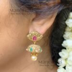 Rajwadi Antique Cone Jhumkas by Manohari in antique gold finish with traditional ethnic design for festive and wedding wear