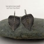 Ruhani paisley heritage earrings with oxidized silver detailing