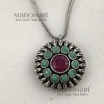 Aarini peacock heritage jewellery set with oxidized stone detailing