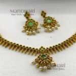 Aarini emerald heritage attigai with green stone detailing