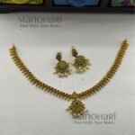 Aarini emerald heritage attigai with green stone detailing