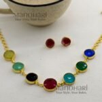 Aarini gloss luxe neckpiece with elegant glossy gold finish detailing