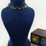 Aarini gloss luxe neckpiece with elegant glossy gold finish detailing