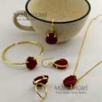 Meher crystal claw pendant set with golden polish detailing