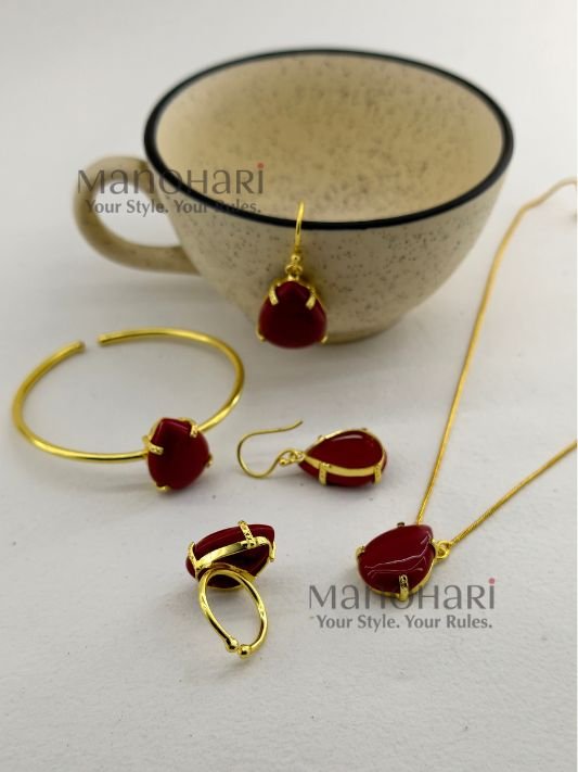 Meher crystal claw pendant set with golden polish detailing