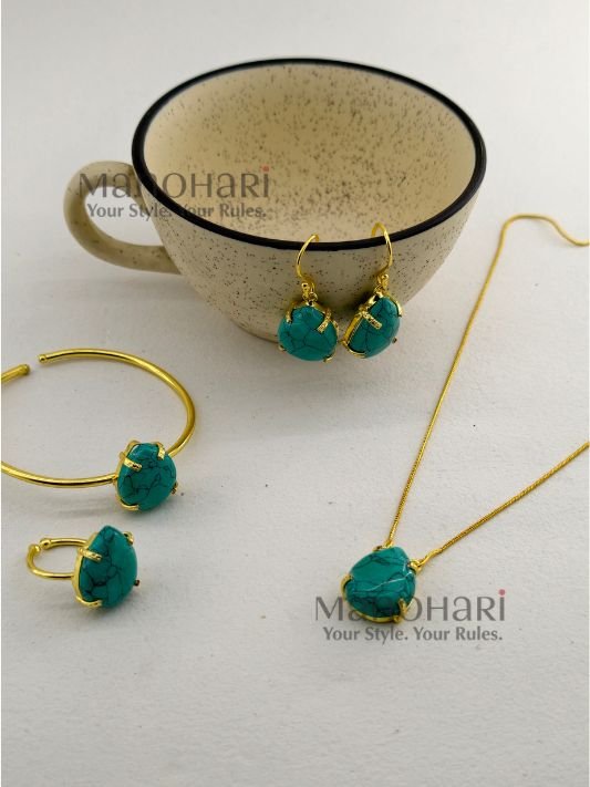 Meher crystal claw pendant set with golden polish detailing