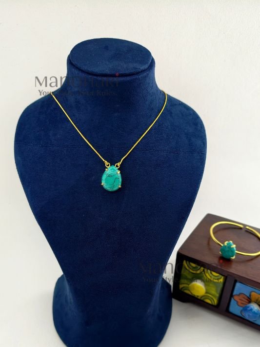 Meher crystal claw pendant set with golden polish detailing
