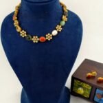 Tanmayi Navarathna grace necklace with floral matte gold stone detailing