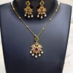 Meher classic charm pendant set with elegant matte gold detailing