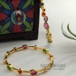 **Lakshita Antique Bangles in premium matte gold polish crafted from brass for women.**