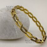 Aarini Charm Link Bracelet crafted in 18K gold-plated 316L stainless steel with a sleek open-cuff design