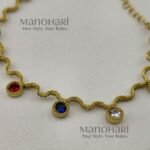 Aurelia WaveGlow Bracelet featuring an elegant wave-inspired design crafted in gold-plated stainless steel with a polished luxury finish