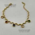 Aurelia WaveGlow Bracelet featuring an elegant wave-inspired design crafted in gold-plated stainless steel with a polished luxury finish