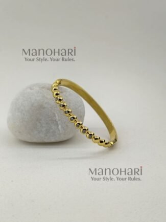 Meher Golden Grace Bracelet crafted in 18K gold-plated 316L stainless steel featuring a sleek and elegant bangle design
