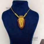 **Rangoli Nettipattam Heritage Chain in premium gold-plated finish with elegant seed bead detailing and traditional 6 cm pendant for women.**
