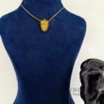 **Vaibhava Nettipattam Heritage Chain crafted from premium brass, featuring a traditional Kerala Nettipattam pendant with an adjustable chain for women.**