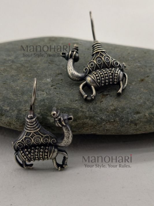 Aurelia Camel Caravan Earrings featuring an intricately detailed camel motif with an elegant oxidised silver finish inspired by Rajasthan heritage