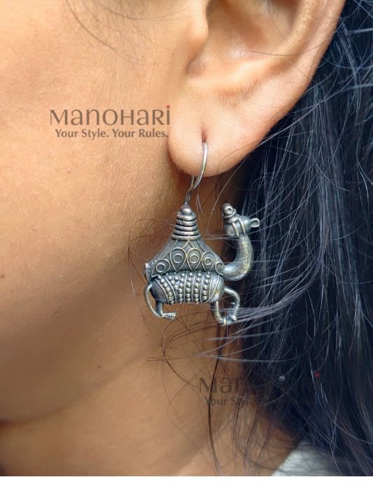Aurelia Camel Caravan Earrings featuring an intricately detailed camel motif with an elegant oxidised silver finish inspired by Rajasthan heritage