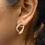Aarini Noir Ivory Statement Earrings featuring a chic black-and-ivory geometric design with elegant modern styling