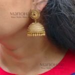 **Rajsi Antique Jhumka Earrings crafted from premium brass with a high gold polish, featuring an elegant 5 cm drop and traditional heritage design for women.**