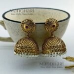 **Rajsi Antique Jhumka Earrings crafted from premium brass with a high gold polish, featuring an elegant 5 cm drop and traditional heritage design for women.**