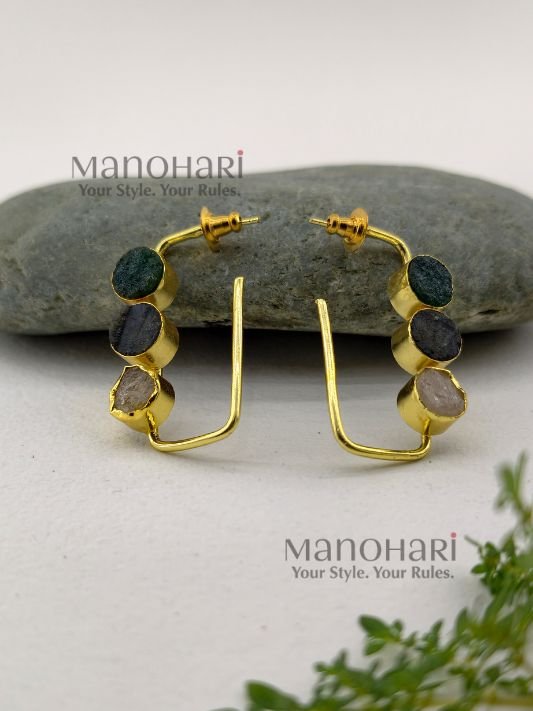 Aarini Rawstone Elegance Earrings featuring natural raw stones set in a gold-polished brass frame with a contemporary geometric design