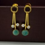 Aurelia Triple Pearl Drop Earrings featuring a minimalist stick design with elegant triple pearl accents