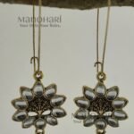 Aurelia White Blossom Drop Earrings featuring floral marquise-cut white stones in a radiant silver-tone finish with elegant long hooks