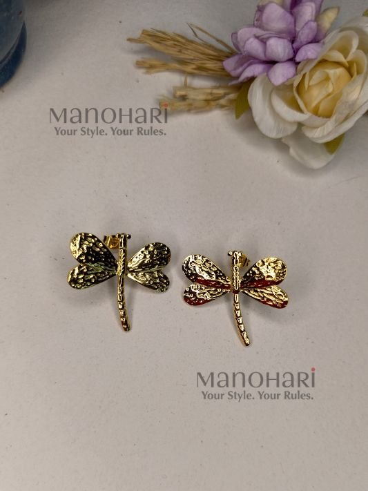 Meher dragonfly charm studs featuring a chic dragonfly design with a radiant gold-tone finish