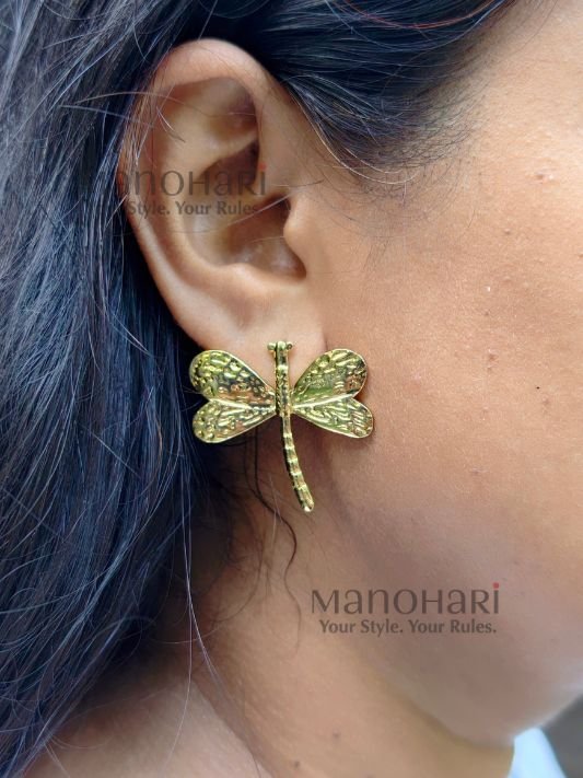 Meher dragonfly charm studs featuring a chic dragonfly design with a radiant gold-tone finish