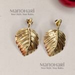 Meher golden vine earrings with elegant 18K gold botanical detailing