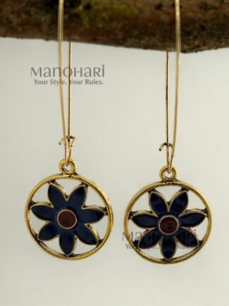 Meher Indigo Radiance Earrings featuring an indigo floral motif with a terracotta center framed within an elegant gold-tone circular design