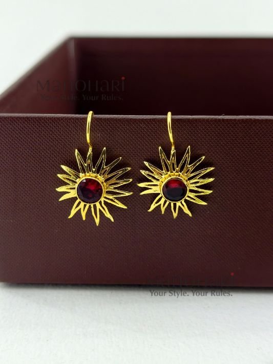 Meher Sunray Charm Hoops featuring a radiant sun-inspired charm crafted in raw brass with a classic hoop design