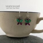 Naina Butterfly Aura Drops featuring a delicate butterfly-inspired design in a lightweight and elegant drop earring style