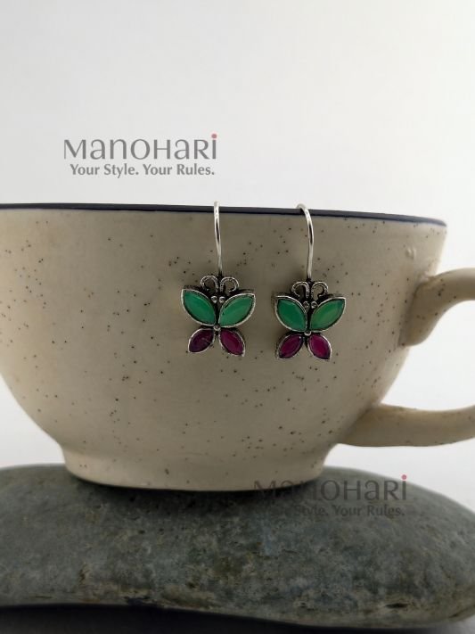 MN-ER-NBAD-NAI-01_1 Naina Butterfly Aura Drops featuring a delicate butterfly-inspired design in a lightweight and elegant drop earring style