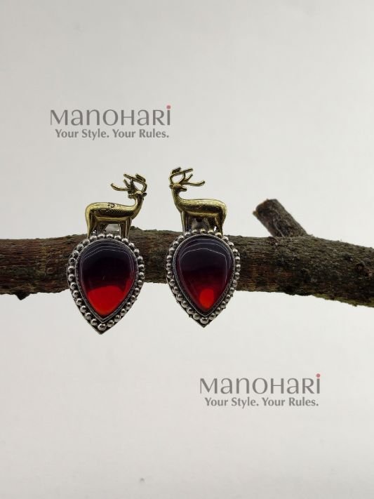 Naina Wild Charm Stud Earrings featuring a playful animal-inspired design with a radiant gold-plated finish and contemporary fashion appeal