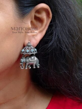 Noor Vintage Elephant Earrings in antique brass finish with intricate elephant motif for women.