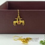 Ruhani deer elegance drops earrings featuring a graceful deer motif with a radiant gold polished finish