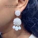 Ruhani floral pearl drop earrings featuring elegant floral detailing and baroque pearl charms